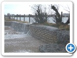 Water draining from field as tide falls